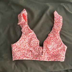 Pink daisy bikini top. Size M. NWOT